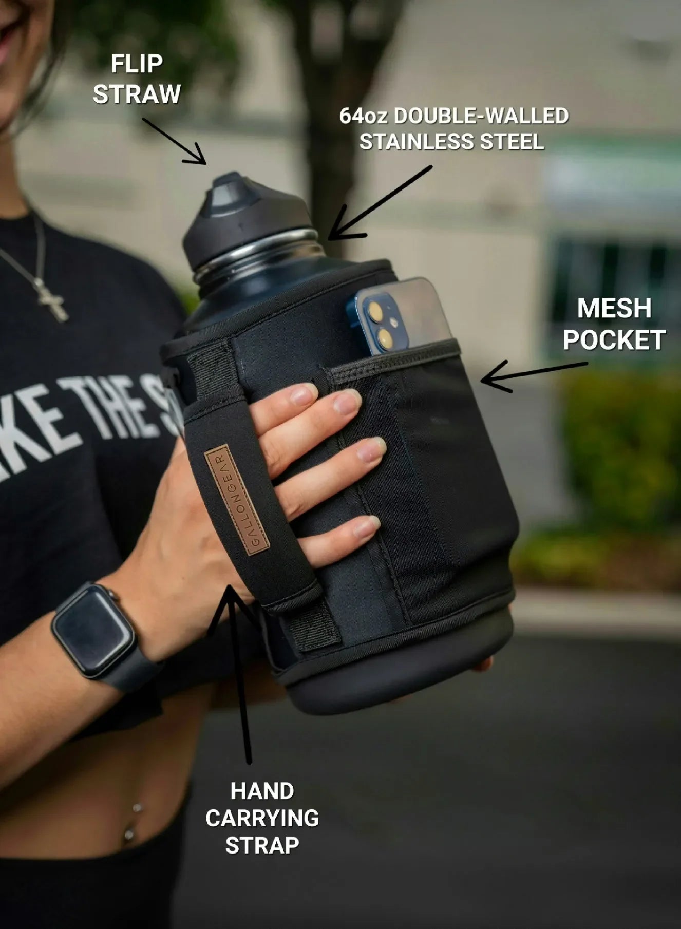 64oz double-walled stainless steel gym water bottle with flip straw, mesh pocket, and hand strap