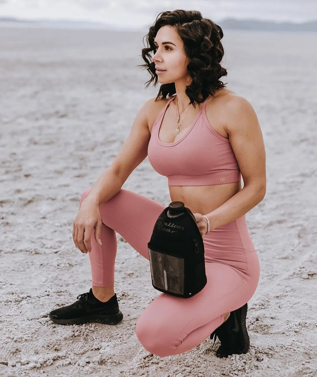 "2025" GALLON GEAR HALF GALLON BOOTY | GYM WATER BOTTLE SLEEVE | MESH POCKETS (BLACK)