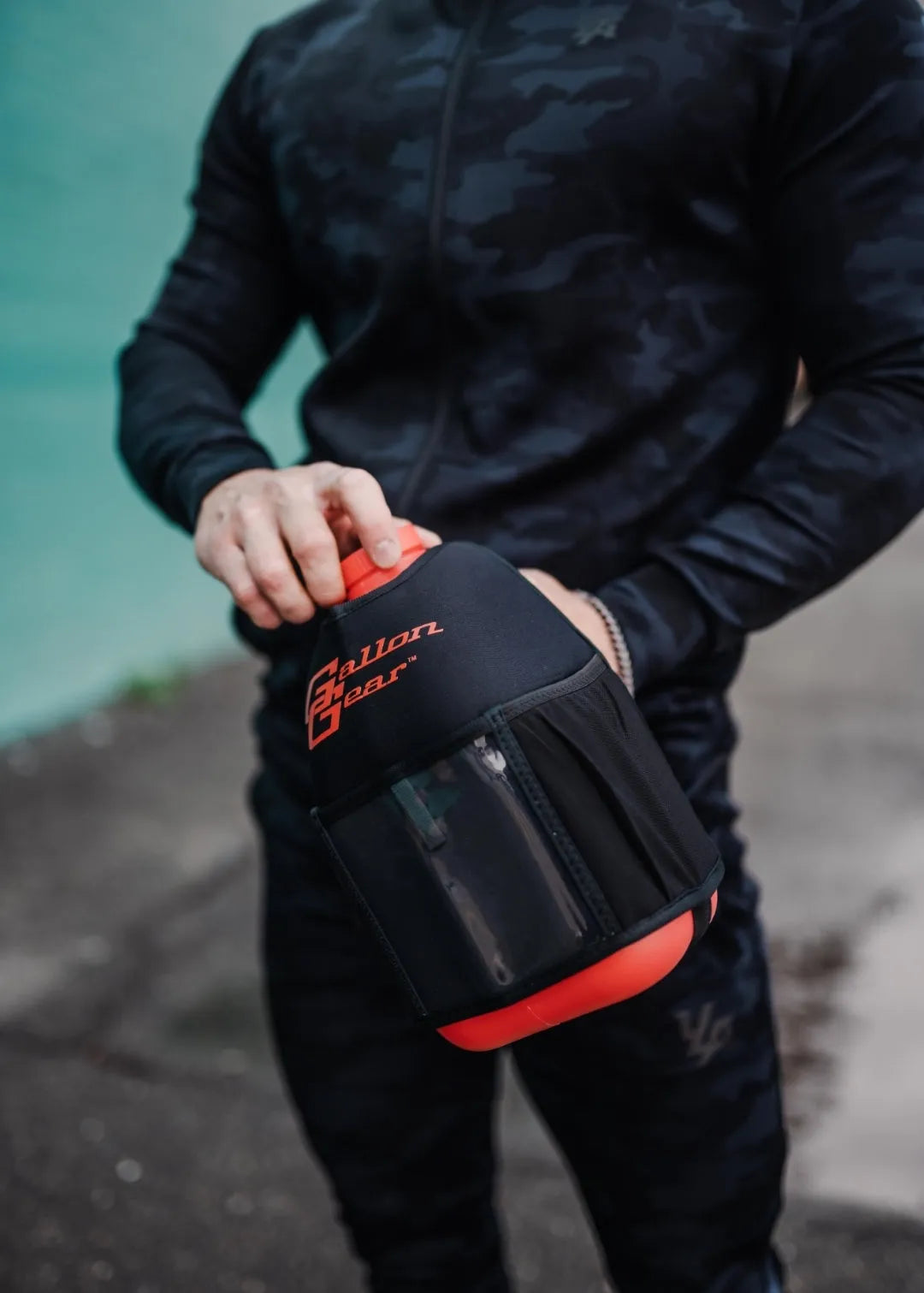 "2025" GALLON GEAR HALF GALLON BOOTY | GYM WATER BOTTLE SLEEVE (BLACK/RED)