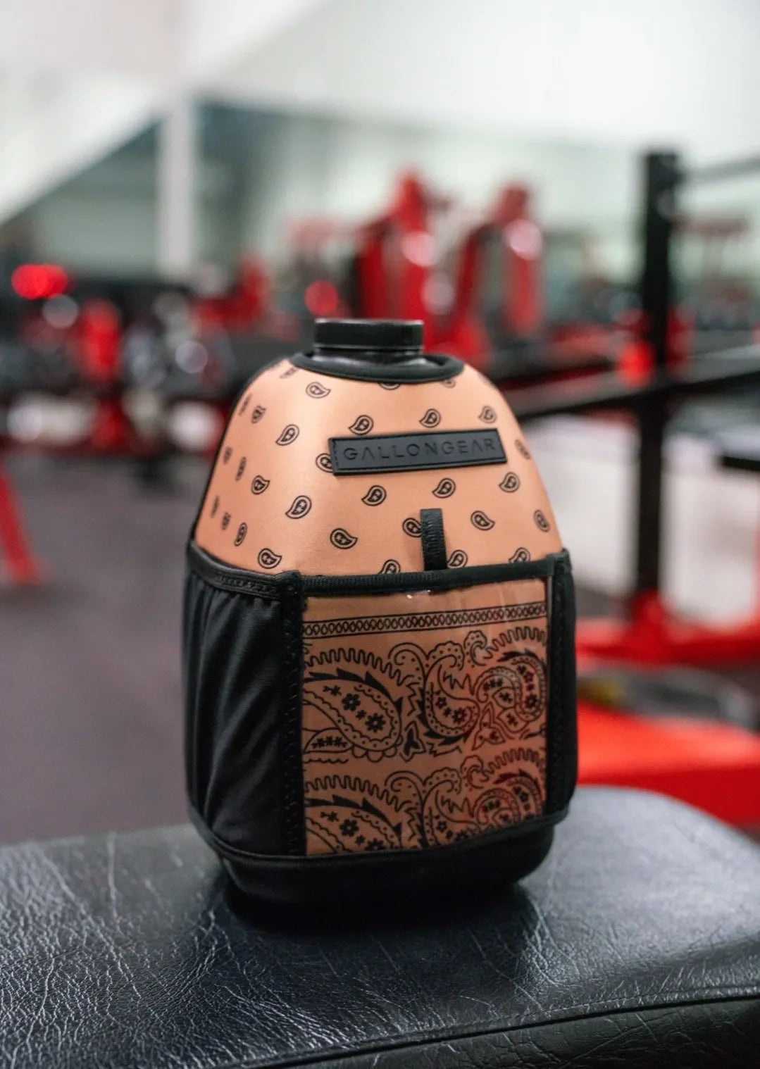 "2025" GALLON GEAR HALF GALLON BOOTY | GYM WATER BOTTLE SLEEVE (BANDANA TAN)